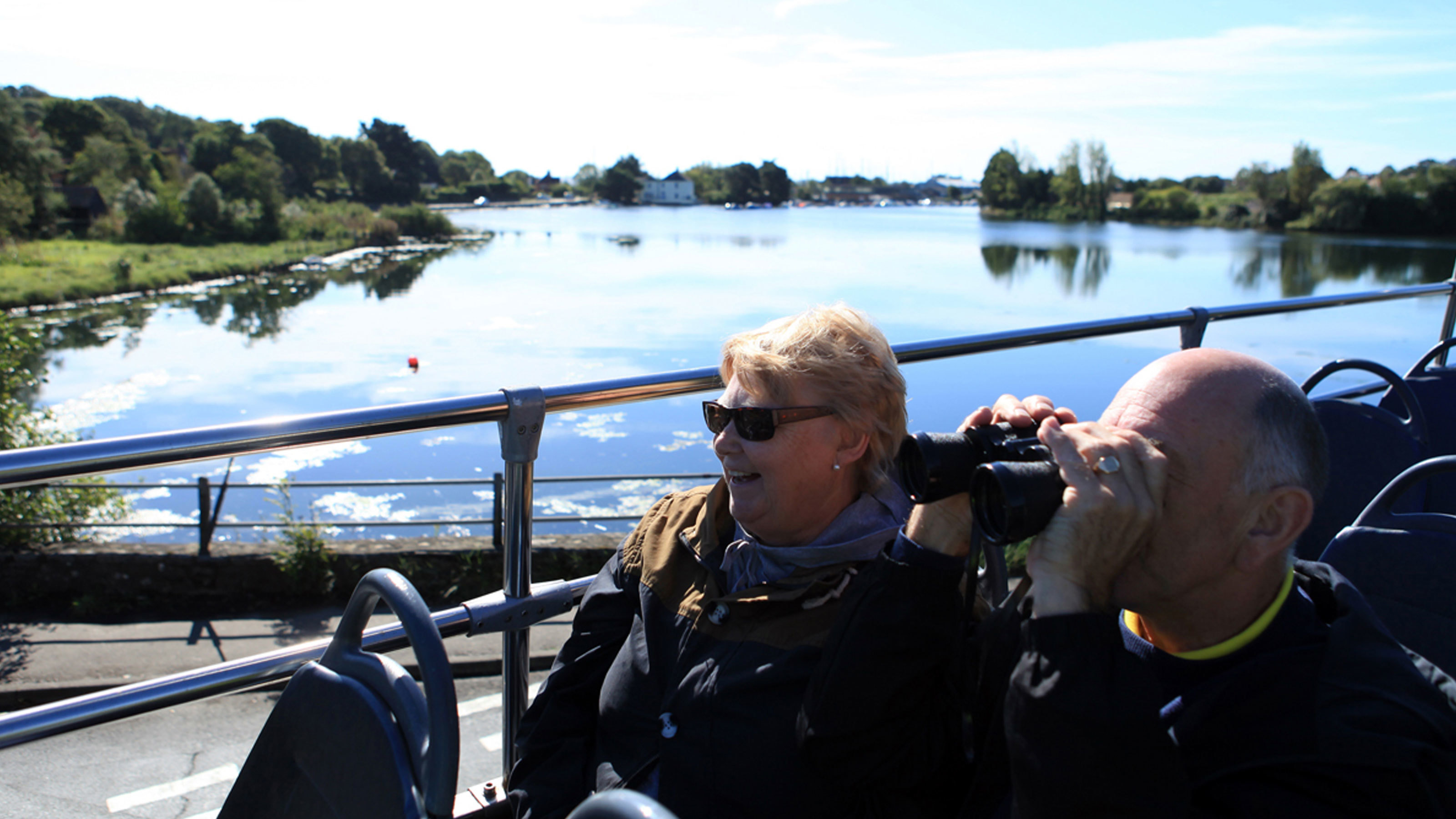 Couple-on-open-top-bus-tour-through-the-New-Forest Couple-on-open-top-bus-tour-through-the-New-Forest